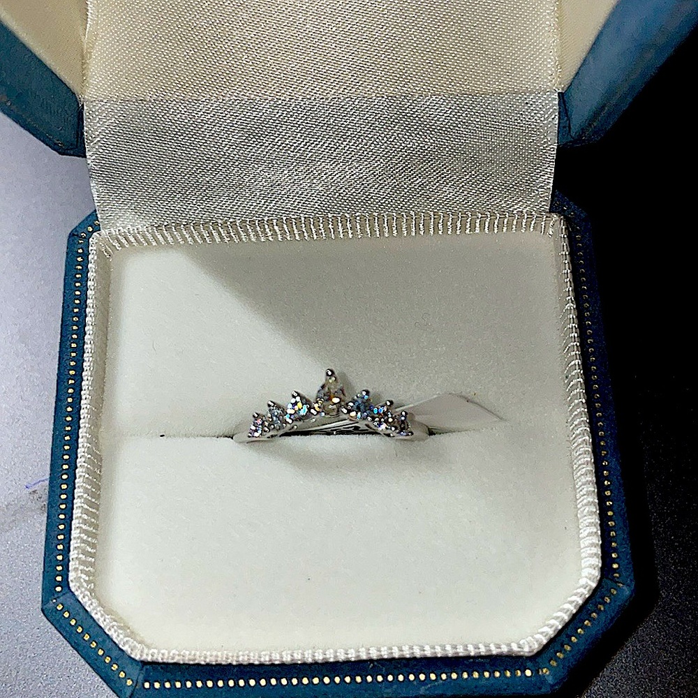 14K white gold.  1.5 CTTW D VVS1 MOISSANITE Size 7.5